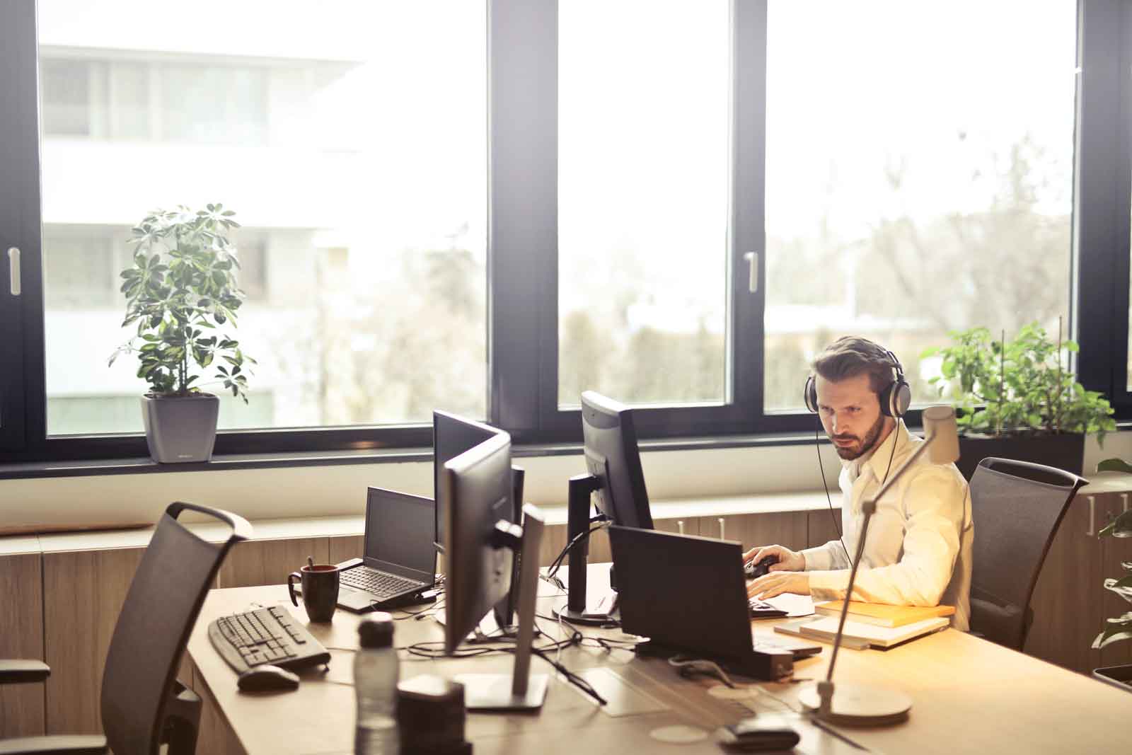 A support agent handling chats from the office
